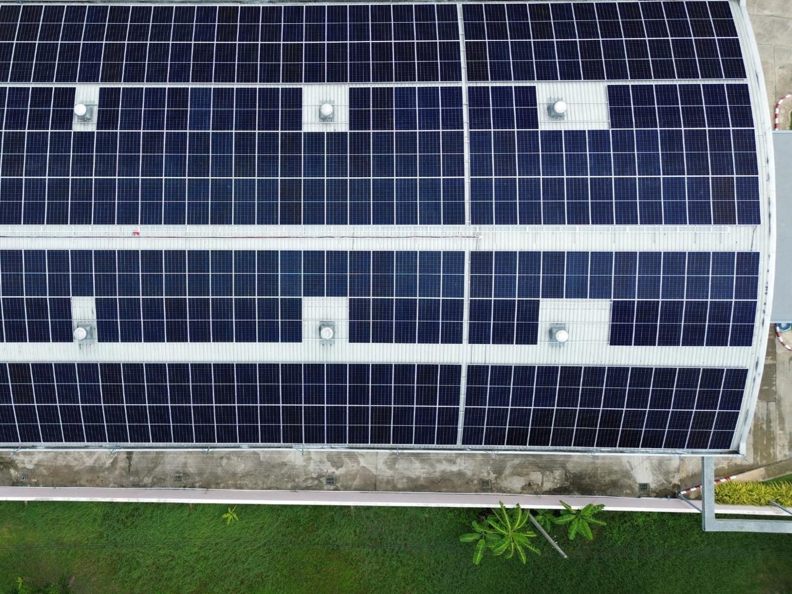 Close overhead view of the solar panel array covering the roof of the RGA diamond cutting workshop