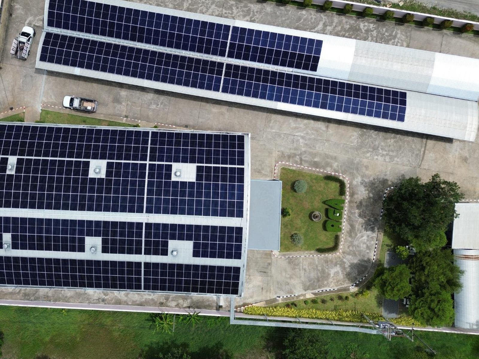 Overhead view of the RGA Diamond Co. site showing solar arrays across multiple factory roofs